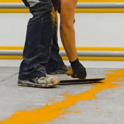 Applying chemical resistant epoxy in West Allis, WI for durable flooring solutions