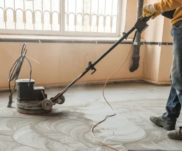 Concrete floor polishing process in a West Allis commercial building during renovation