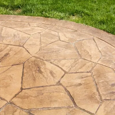 Concrete curbing installation in Hartland WI showcases modern landscaping techniques for outdoor spaces