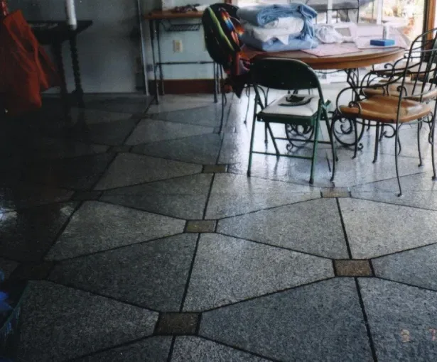 Decorative concrete flooring installation in a Sussex home showcasing unique geometric patterns and textures