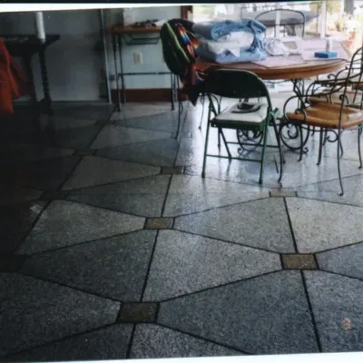 Decorative stained concrete flooring enhances interior space in Waukesha, showcasing artistry and design