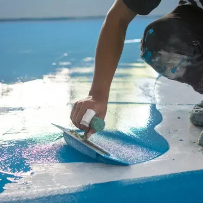 Application of durable epoxy floor coating in Hartland, Wisconsin for enhanced aesthetics and protection