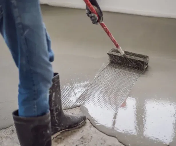 Professional installation of epoxy concrete floor in West Allis for durable and attractive finish