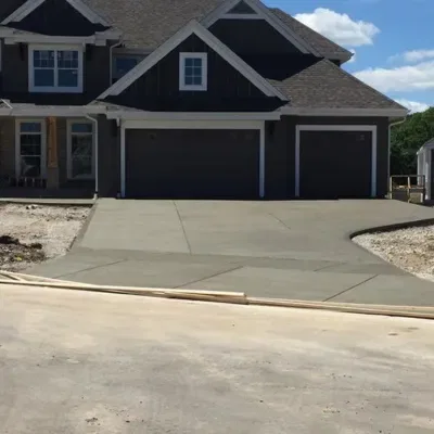 Garage floor installation in Delafield WI features a newly poured concrete surface ready for finishing