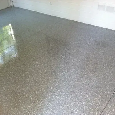 Stained concrete flooring in Waukesha showcases a smooth, polished surface enhancing indoor aesthetics and functionality