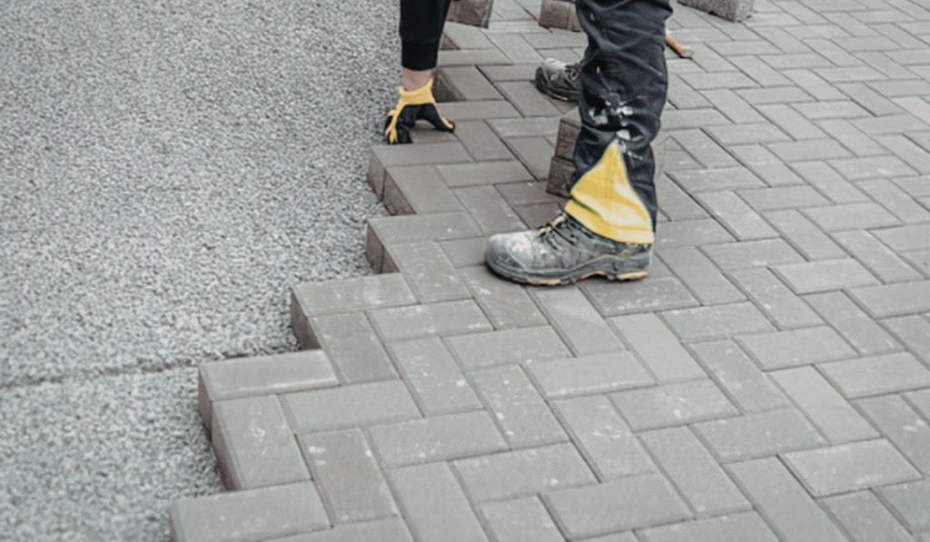 Contractor installing a concrete driveway in Waukesha