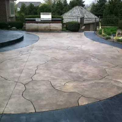 Decorative colored concrete pathway enhances outdoor space in Waukesha