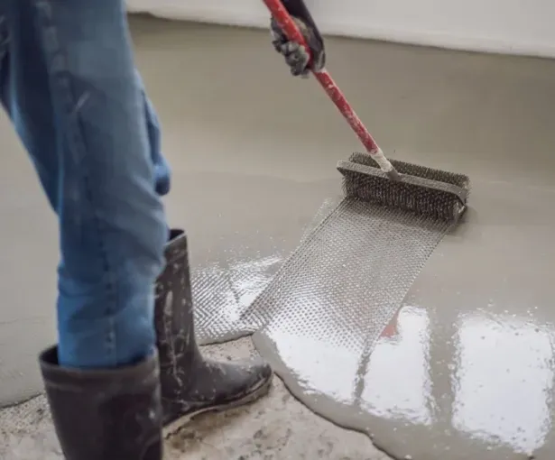 Professional installation of epoxy concrete floor in West Allis for durable and attractive finish