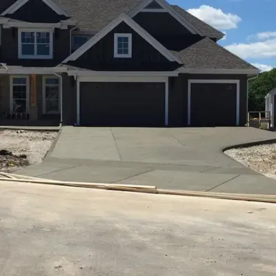 Garage floor installation in Delafield WI features a newly poured concrete surface ready for finishing
