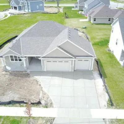 Concrete garage floor resurfacing project in Menomonee Falls Wisconsin for residential property improvement