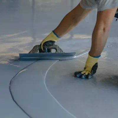 Expertly applying high gloss epoxy finish in Pewaukee WI for a durable and attractive surface
