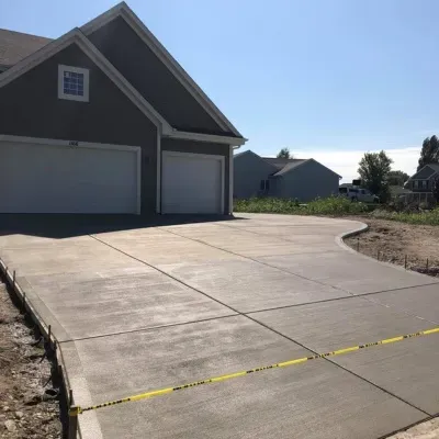 Stamped concrete walkway installation in West Allis, Wisconsin with a bright sunny day overhead