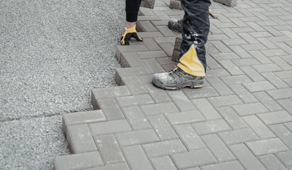 Contractor installing a concrete driveway in Waukesha